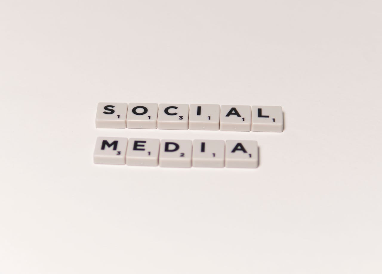 why-choose-us Scrabble tiles spelling social media on a white background, representing digital communication concepts.